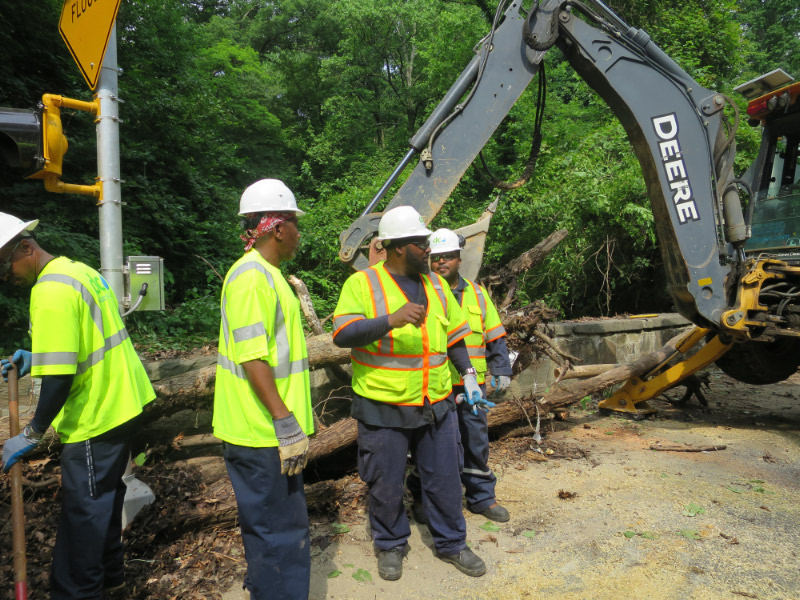 DC Water's inlet and outlet cleaning crew is headed by Vincent Sims (center).