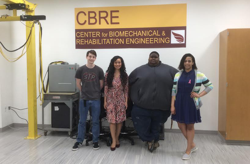 Dr. Thompson with UDC engineering seniors Steven Cale, Charles Wilson and Beachrhell Jacques.