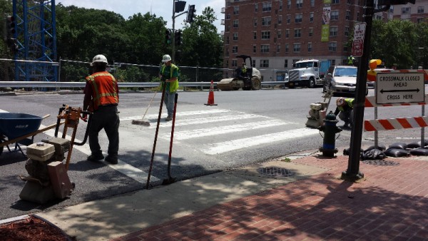 Scrubbing out the crosswalk on Connecticut at Yuma on July 11th, 2014.