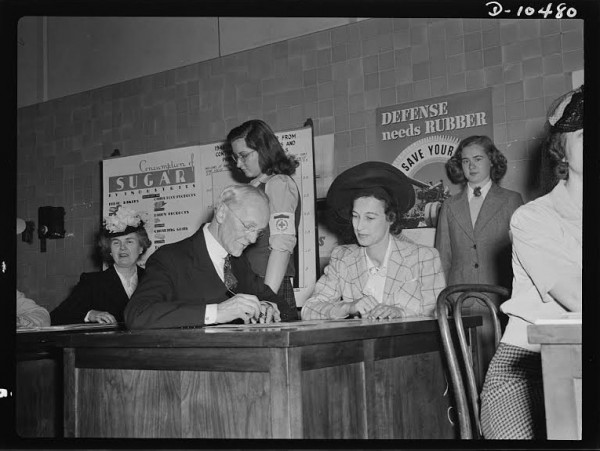 Signing up for sugar rationing, May 1942 (Library of Congress) 